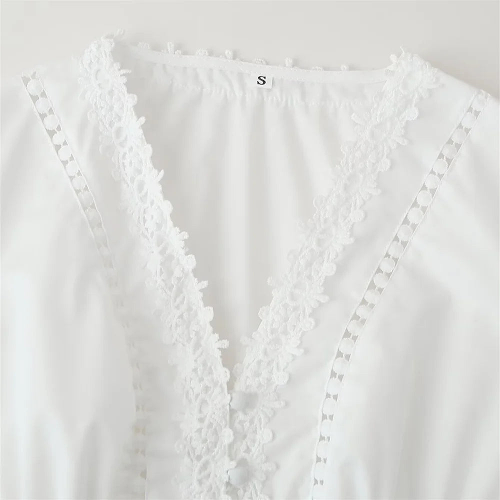 close up neckline of the white laurel lace dress