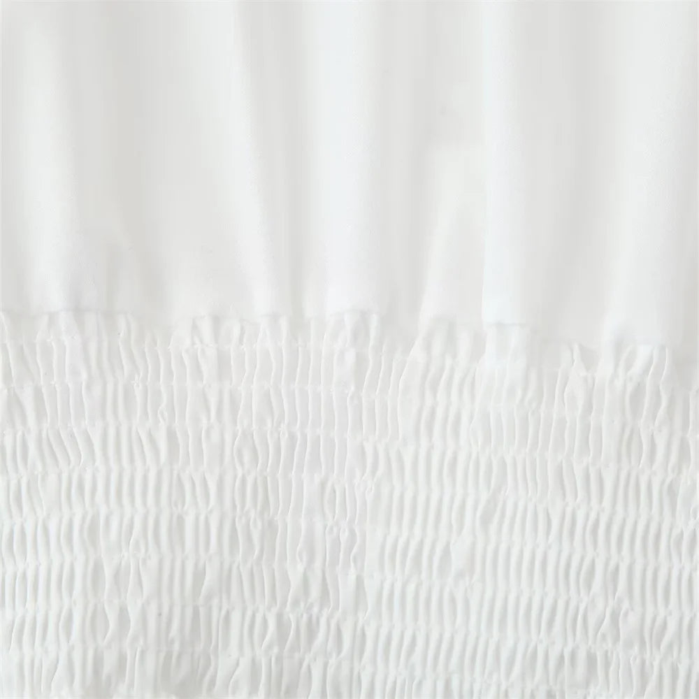 waistline detail of the white laurel lace dress