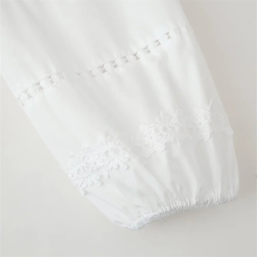 sleeve detail of the laurel lace dress in white