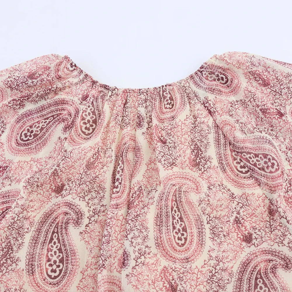 rear view flat lay of the rosette tiered dress