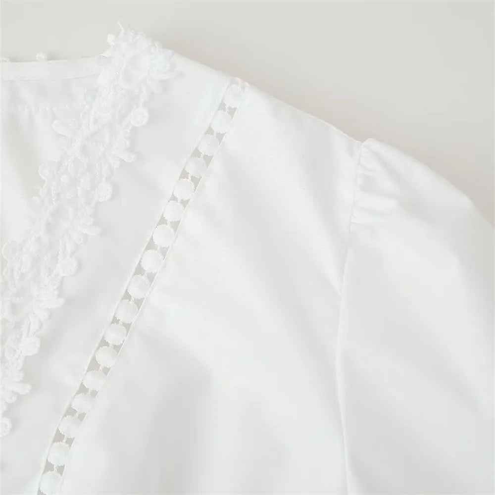 shoulder detail of the laurel lace dress in white