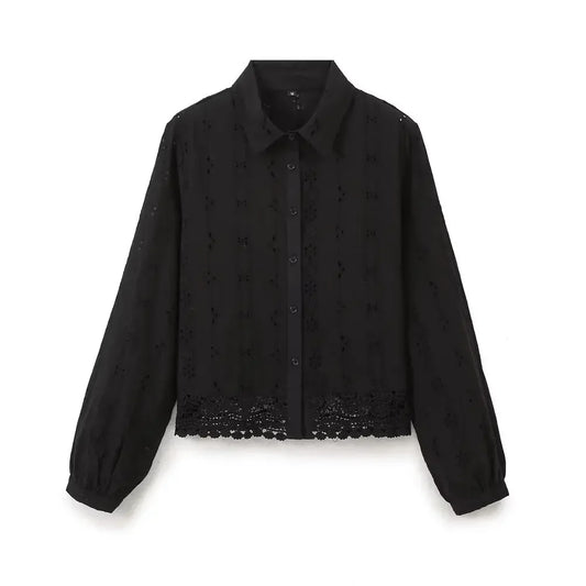 Front view of black Celeste Embroidered Lace Shirt by Noir by Lina, featuring button-down design, balloon sleeves, and delicate floral lace hem