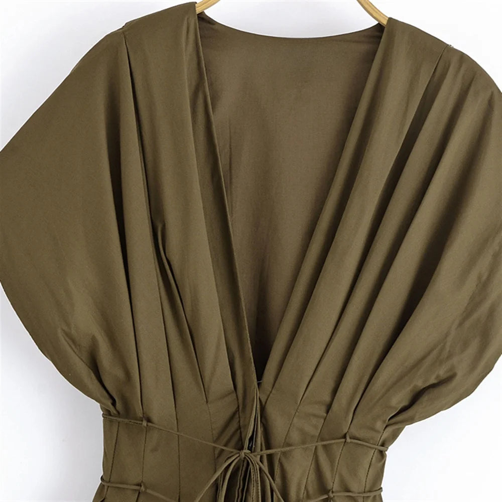 Close up of neck line of olive grace A line dress